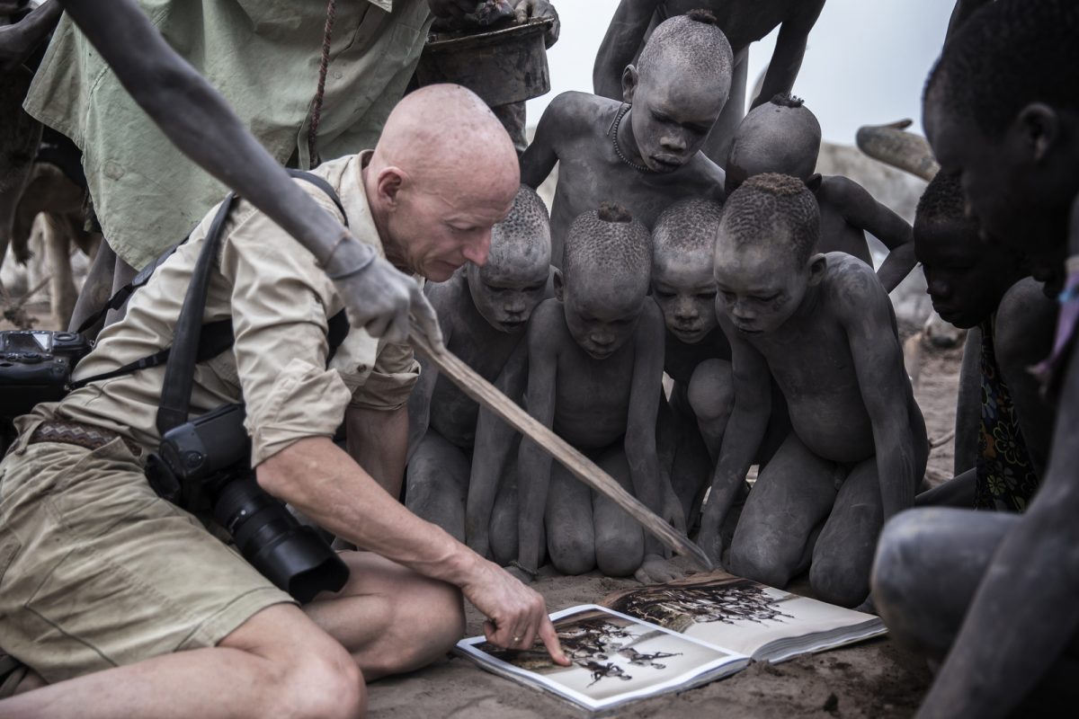 Jimmy Nelson with children, Mundary, South Sudan